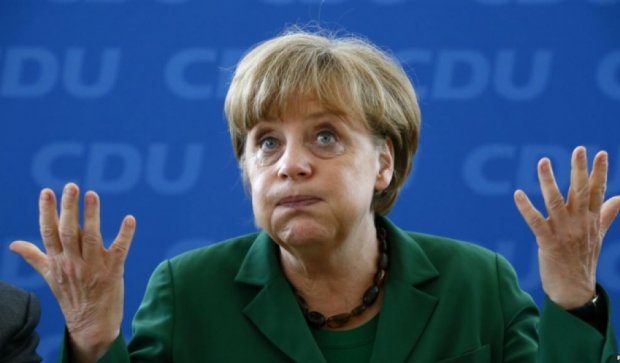 Германия не будет менять конституцию из-за беженцев - Меркель 