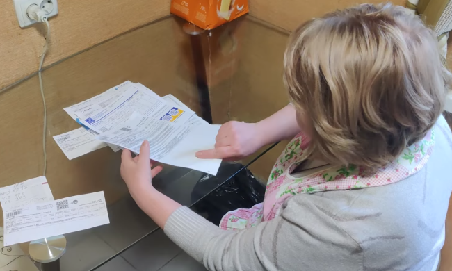 Счета за коммуналку. Фото: скрин youtube