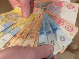 Деньги. Фото: скрин youtube