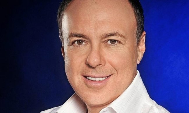 Связанный с Азаровым бизнесмен выбросился из окна