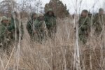 Військові в полі, фото з вільних джерел