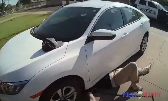 Мужчина под авто, скриншот