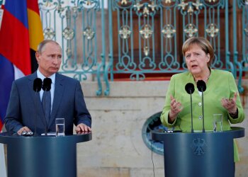 Володимир Путін та Ангела Меркель