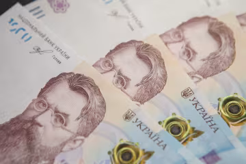 Деньги гривны выплаты помощь