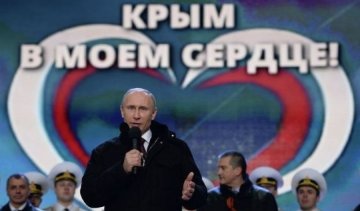 Путин попросил крымчан "потерпеть еще немного"