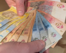 Деньги. Фото: скрин youtube