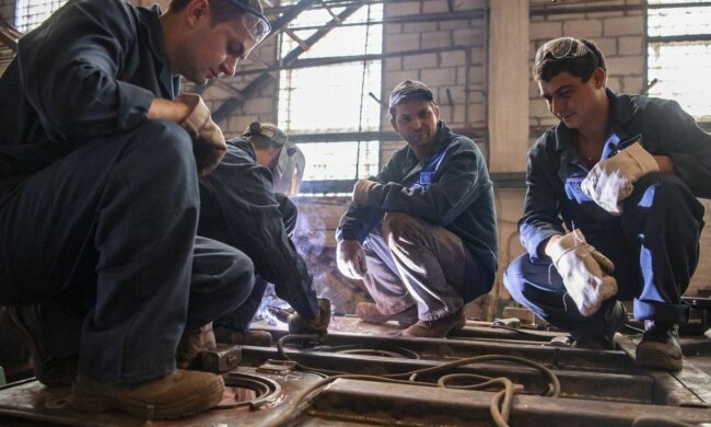 Рабочие, фото: Unian