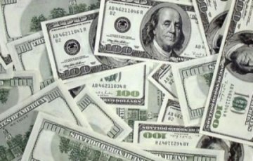 Долар подешевшає до кінця року  на 50 копійок