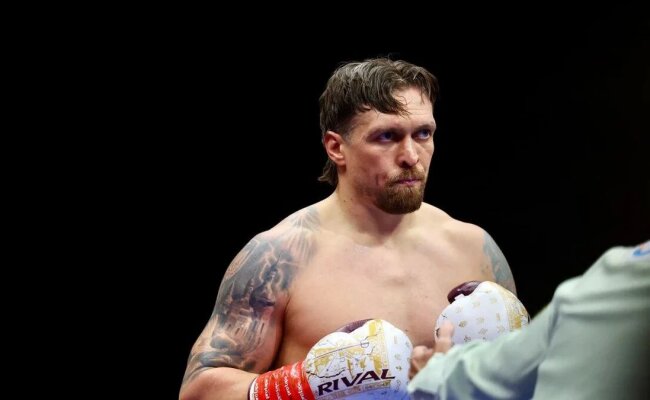 Олександр Усик із донькою на вечорі боксу у Львові