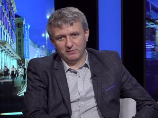 Юрий Романенко, скриншот из видео