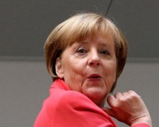 Меркель втекла від Трампа з Путіним