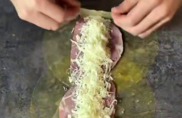 Равлики з шинкою та сиром, кадр з відео