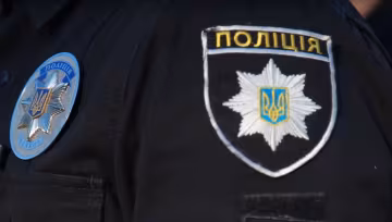 полицейский, скриншот из видео