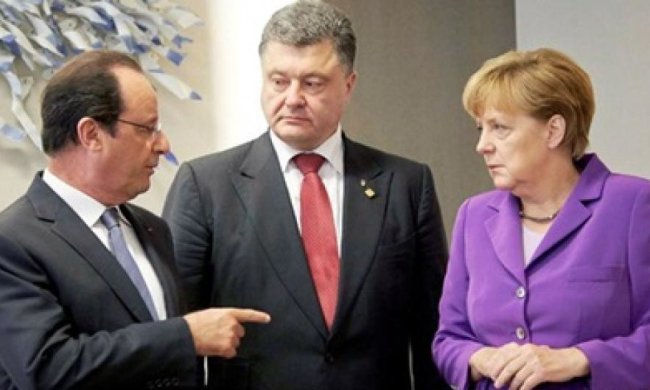 Олланд і Меркель за відведення зброї на Донбасі