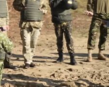 Военные, фото: скриншот из видео