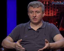 Юрий Романенко