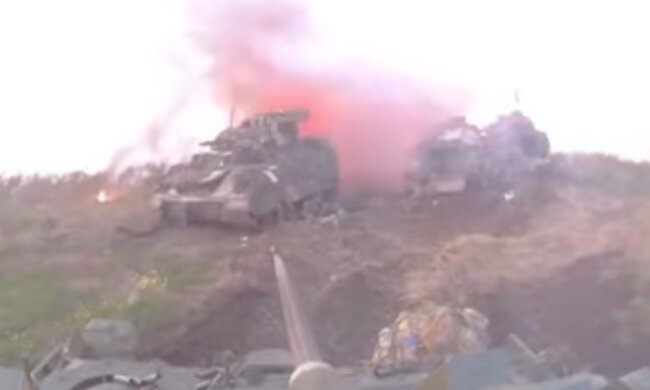 Кадры с поля боя, война в Украине, скриншот из видео