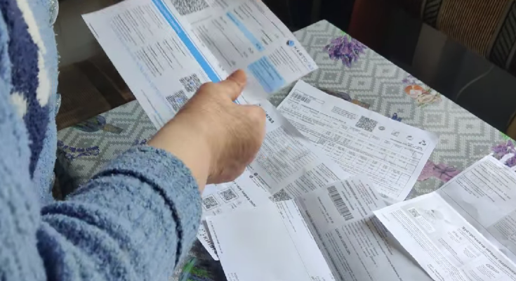 Платіжки за комуналку. Фото: скрін youtube