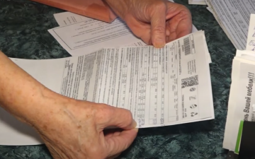 Платежки за коммуналку. Фото: скрин youtube