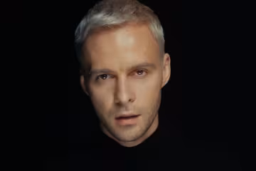 Макс Барських, кадр із кліпу "Римую"