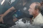 Путин в лодке, фото Твиттер