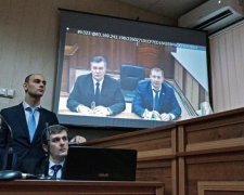 Порошенко отвечает перед судом за измену Януковича