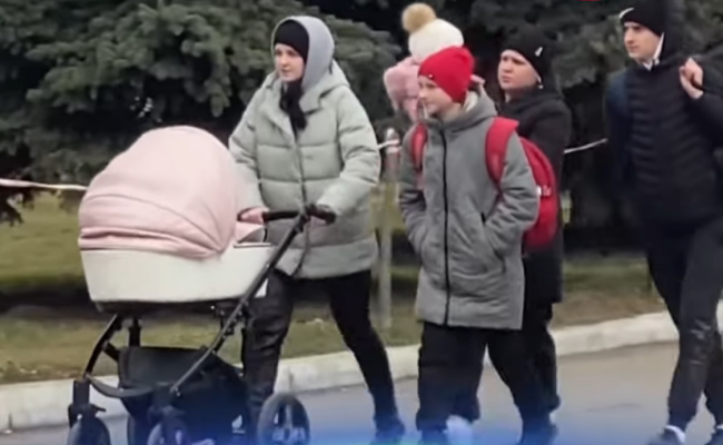 Украинские беженцы, скриншот из видео