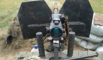 Російські окупанти заховали арсенал зброї під Троїцьким