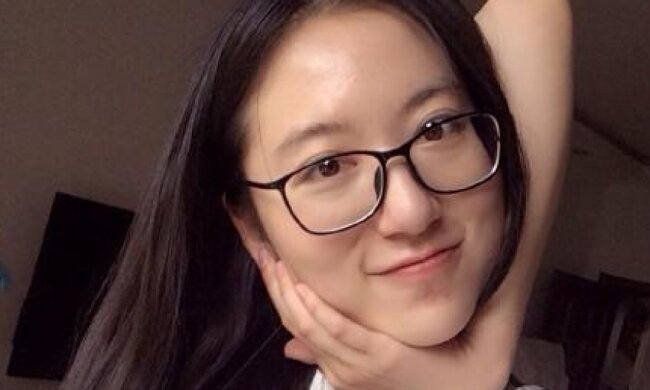 Флеш-моб: китайцы тянутся к уху через подбородок  (фото)