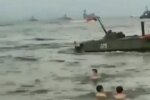 Военная техника на пляже в Каспийске, скриншот из видео