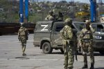 Окупанти у місті, фото з вільних джерел