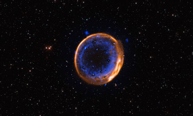 Залишок наднової SNR 0509-67.5, фото: ESO/P. Das et al. Background stars (Hubble): K. Noll et al