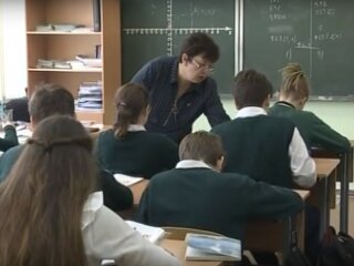 вчитель, скріншот з відео