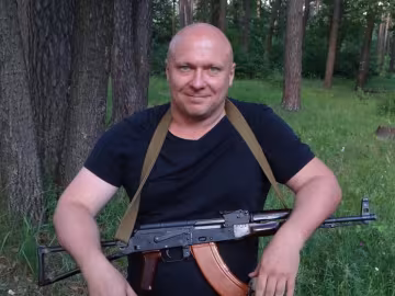 В Киеве проломили череп догхантеру Святогору: народный самосуд над мучителем, фото 18+