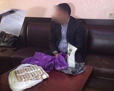 Чиновников из Минобороны поймали на пол миллионной взятке (фото)