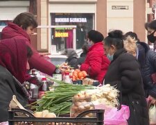 На рынке, кадр из видео