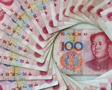 Китаец покромсал 21 тысячу долларов