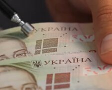 Банкноти гривні, скріншот з відео