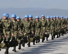 Фарбовані миротворці: що задумала Росія