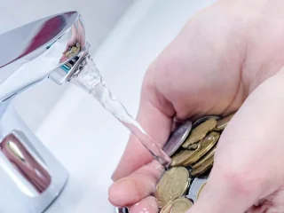 Лічильник води та рахунок за комунальні послуги