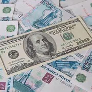 Доллар подешевел на 50 копеек