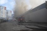Пожежа на місці влучання дрона по поштовому відділенню в Харкові