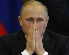 Під Києвом затримали грабіжників з візиткою Путіна