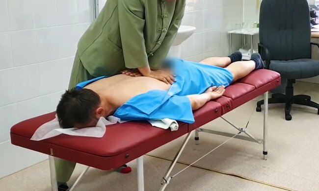 Боль в спине, кадр из видео