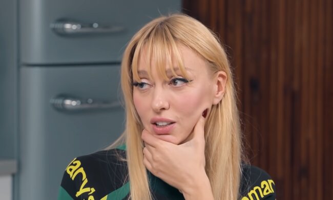 Оля Полякова, скриншот из видео