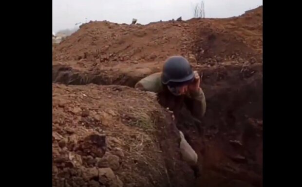 Воїни ЗСУ в окопах. Фото: скриншот Youtube