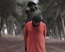 ІДІЛ опублікувала страту заручника малолітнім джихадистом (фото)