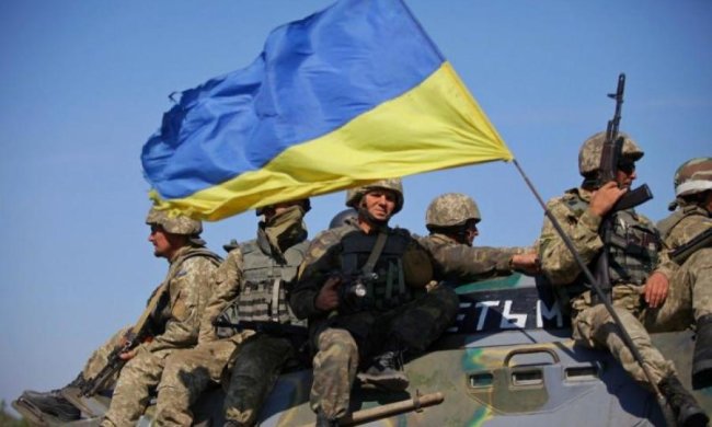 Окупанти познущалися над мертвим українським солдатом: фото