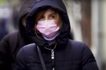 люди в масках, скріншот з відео