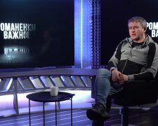 Юрий Романенко